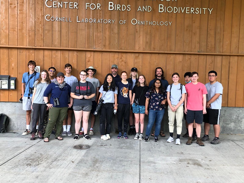 Group photograph at Young Birders Event 2022 in front of the Cornell Lab